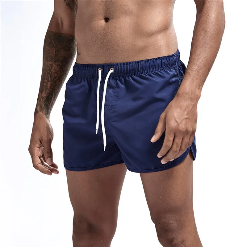 New Men Fitness Bodybuilding Shorts Man Summer Gyms Workout Male Breathable Mesh Quick Dry Sportswear Jogger Beach Short Pants