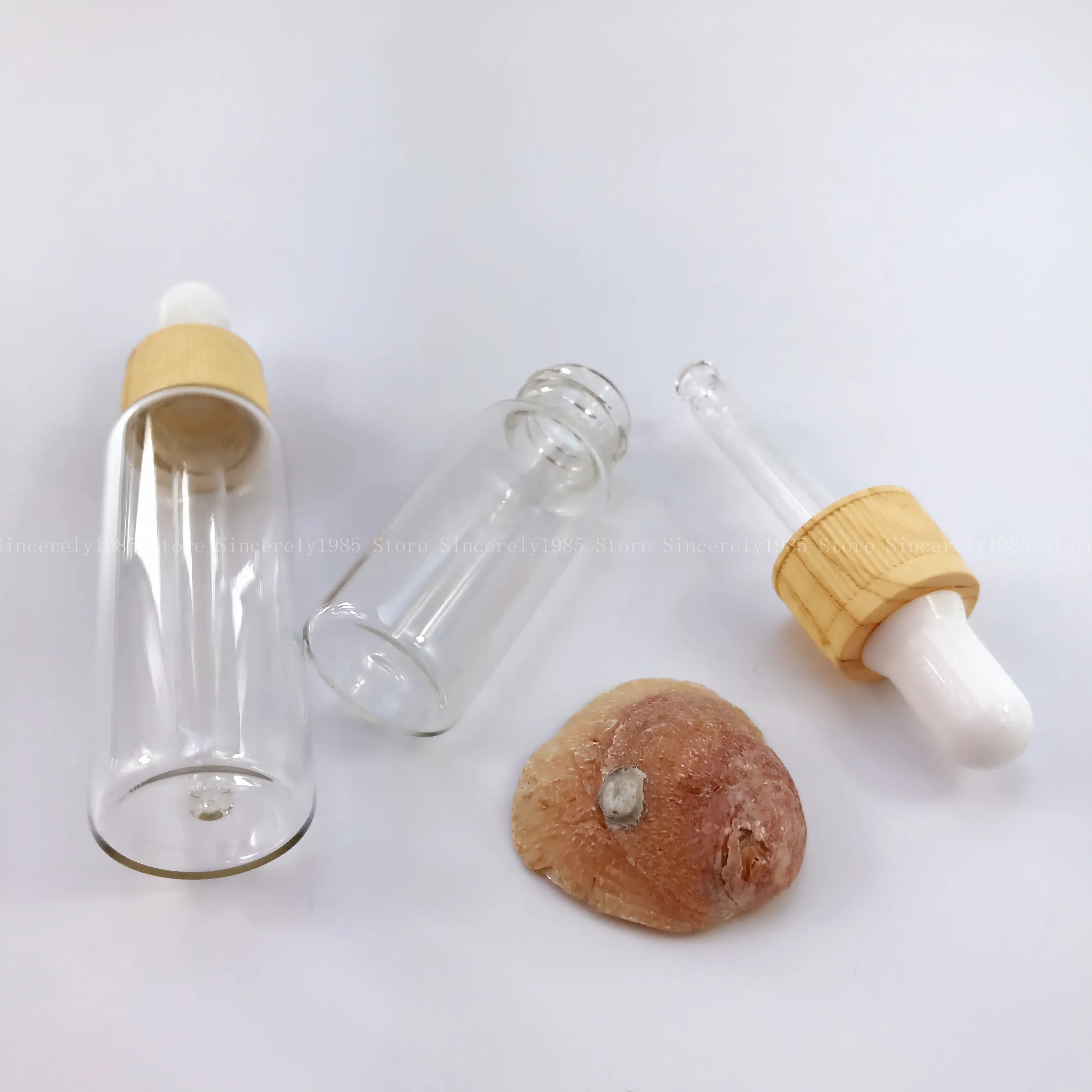 

10 Pcs of 5/10/15/20 ML Clear Glass Dropper Bottle Refillable Essential Oil Fragrance Perfume Pipette Bottle with Wood Grain Cap