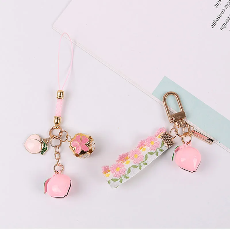 

Creative Asakusa Pink Temple Peach Ring Keychain Defensive Luck Love Career Praying Keyring Earphones Bag Hanging Key Chain Gift