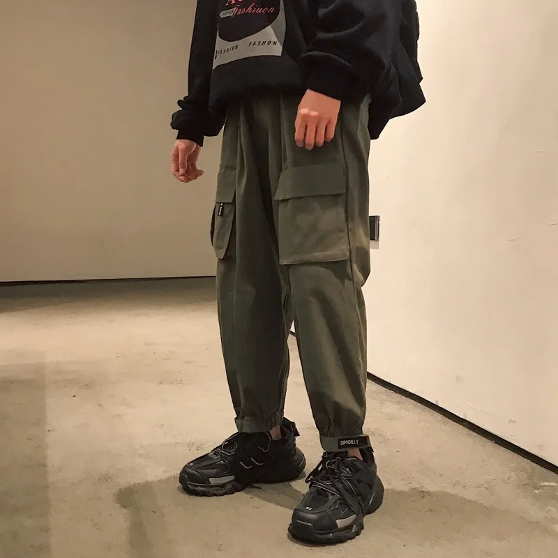 

UYUK 2019 Autumn Wild Trend Street Loose Casual Big Pocket Solid Color Beam Foot Men's Overalls Joggers Streetwear Hip Hop