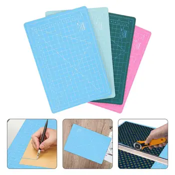 

4Pcs A5 Size Marking Durable PVC Handmade Model Cutting Mat for Scrapbooking Quilting Sewing Arts Crafts (Assorted Color)