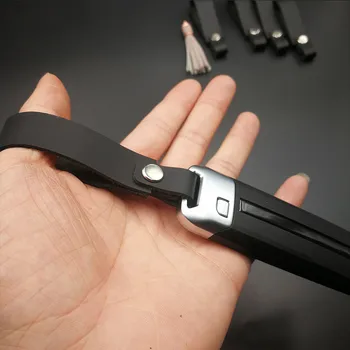 

Leather hand strap key chain pendant creative personality car remote control chain ring simple male and female key chain pendant