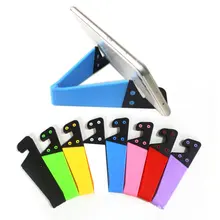 Baixo preço universal desktop dobrável v-em forma de suporte do telefone móvel colorido v-shaped preguiçoso base de suporte