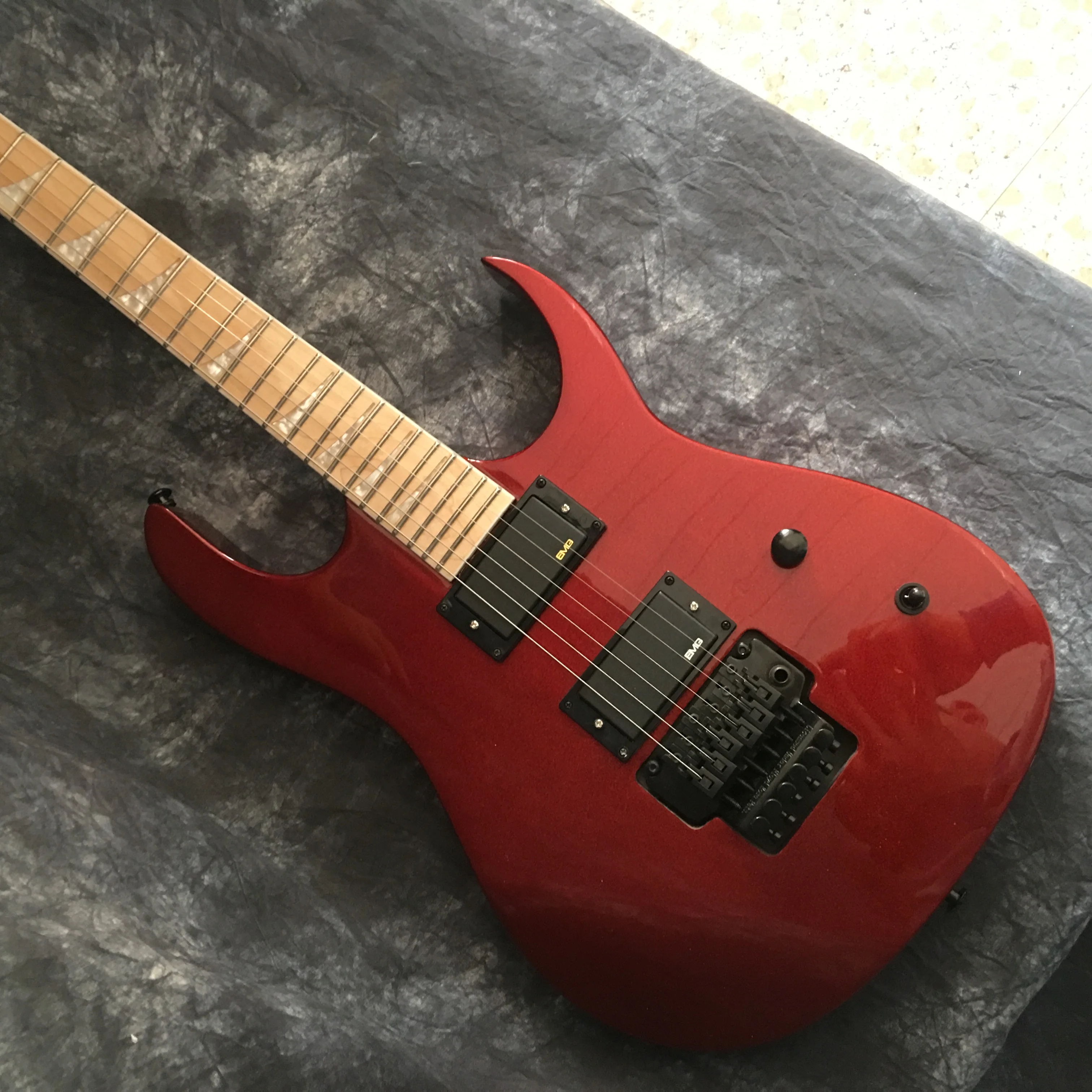 red and gold guitar