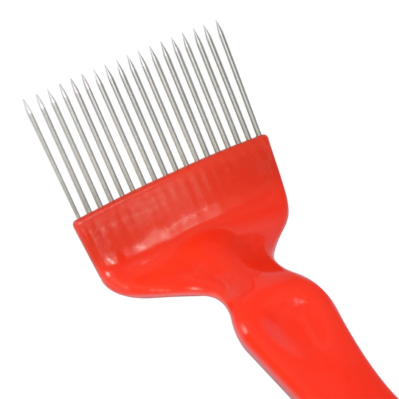 Peine Beekeepers uncapping fork