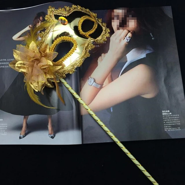 A 13in gold plastic stick - masquerade masks accessories