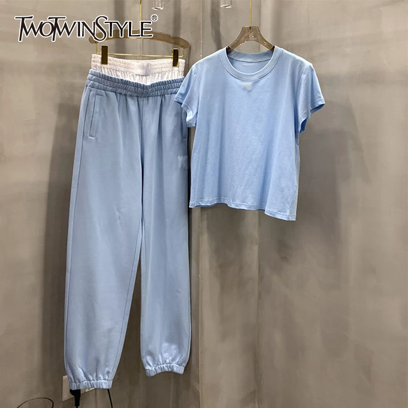 TWOTWINSTYLE Pure Color Two Piece Sets For Female O Neck Short Sleeve High Waist Shirt With Hem Beam Foot Pants Women