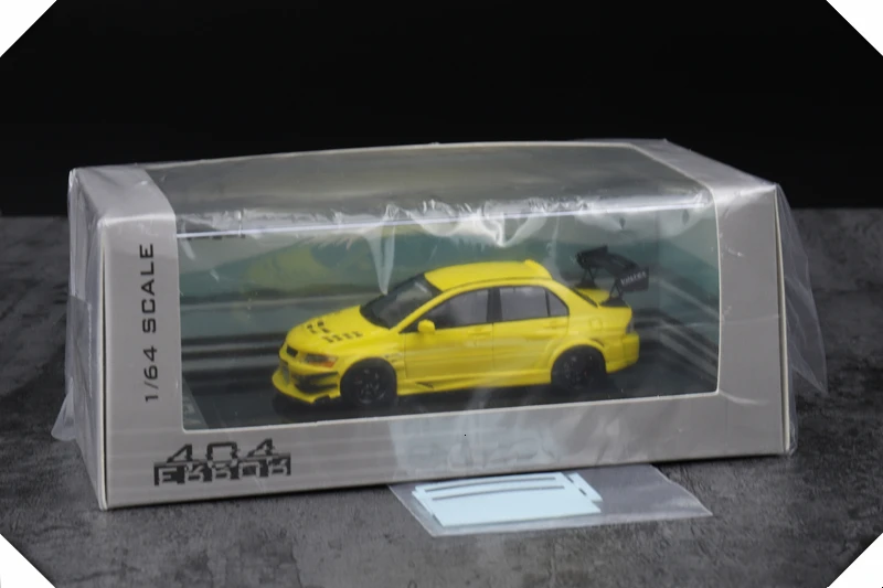 1: 64 масштаб EVO VII семь поколения Модель автомобиля желтый смолы статического состояния ремонт автомобилей изысканный моделирование мужской подарок Коллекционирование
