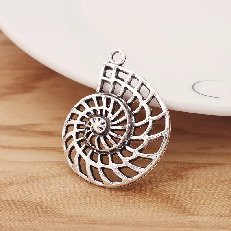 

10 Pieces Tibetan Silver Hollow Shell Conch Sea Snail Charms Pendants for DIY Necklace Bracelet Earring Jewellery Making 36x29mm