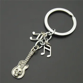 

FREE SHIPPING BY DHL 100pcs/lot 2019 New Pumpkin Keychains Skull Guitar Keyrings for Halloween Gifts
