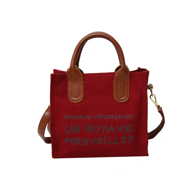 

2019 New Korean Version of The Simple Wild Letter Canvas Shoulder Bag Female Multi-function Portable Canvas Fashion Tide Bag