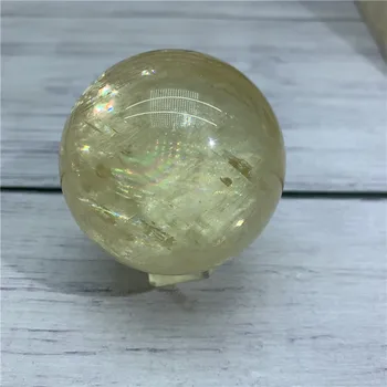 

Unique about 65mm natural light yellow rainbow calcite sphere reiki healing crystals iceland spar ball energy stone