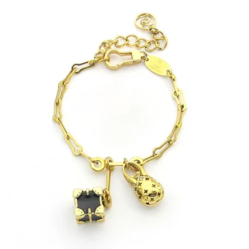 

Factory price direct selling v-hanging black gift box dinosaur egg print four leaf flower bracelet double Pendant Bracelet