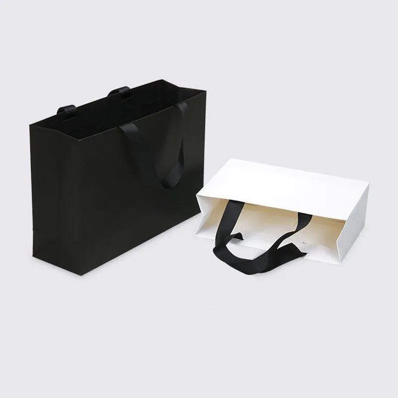 100 Stücke Hohe qualität Schwarz Weiß Kraftpapier Tasche Mit Griff Hochzeit Tasche Modische tuch schuhe geschenk papiertüten Großhandel – Detail 7