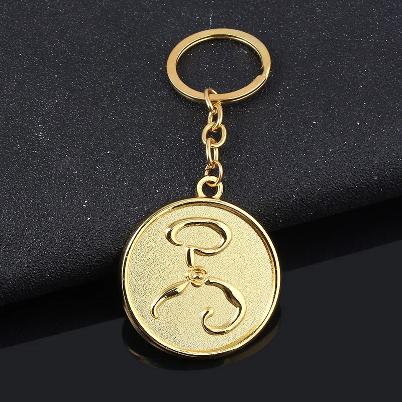 

Cthulhu Mythos The King in Yellow Logo Keychain The Unspeakable Hastur Miskatonic University Badge Key Chain Car Keyring Jewelry