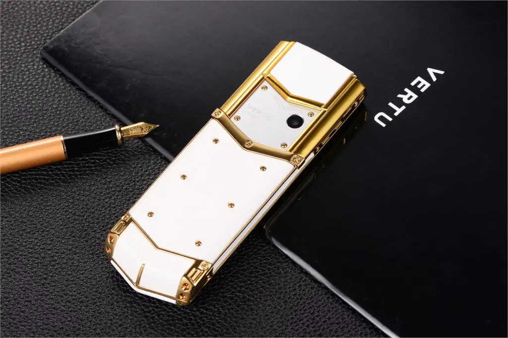 Бесплатный подарок кожаные сумки Meatl тела роскошный бар телефон V10 Dual Sim Bluetooth мобильный телефон вибрации Mp3 Mp4 FM