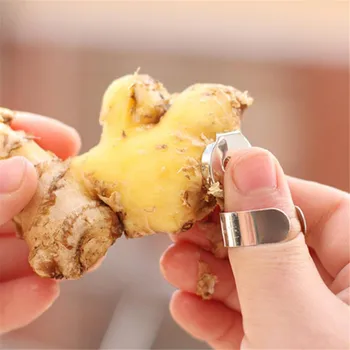 

Multifunctional garlic planer peeling machine creative fruit knife garlic planer ginger peeling kitchen