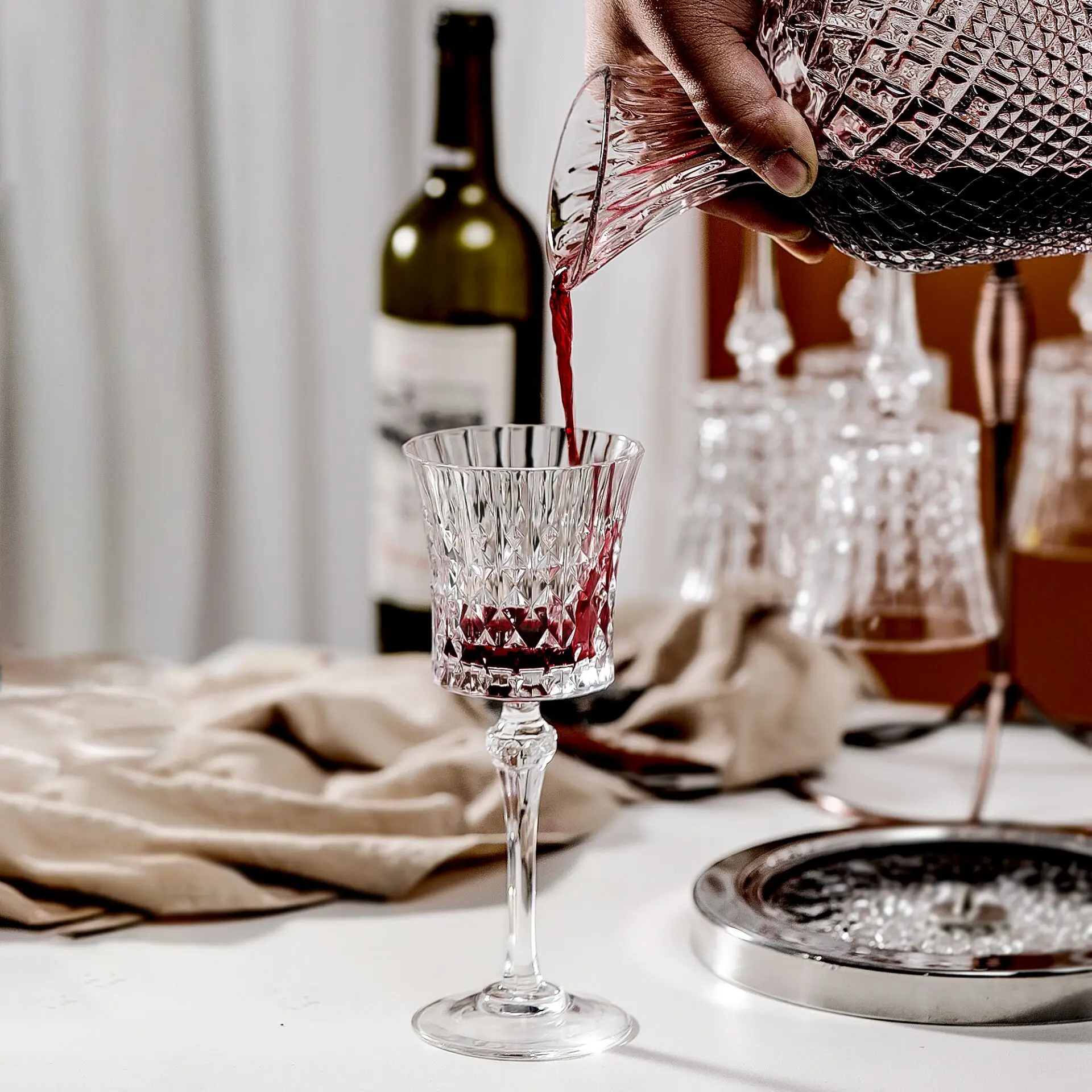 https://ae01.alicdn.com/kf/H3f951e85e25744ba8b7c016255481d07g/Rotating-Tumbler-Wine-Decanter-Goblet-Set-Luxury-European-Carved-Glass-Red-Wine-Bottle-Cups-Home-Bar.jpg