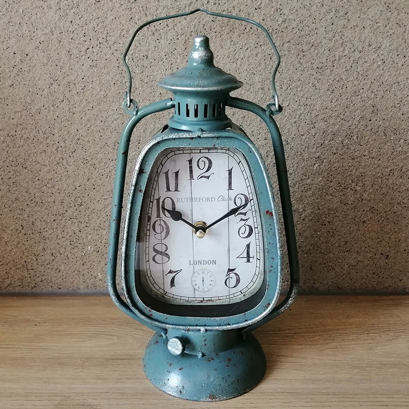 

Antique Blue Iron Lantern Shape Table Clock With Hanging Handle And Round Bottom Base European Home Garden Bar Decor Metal Clock