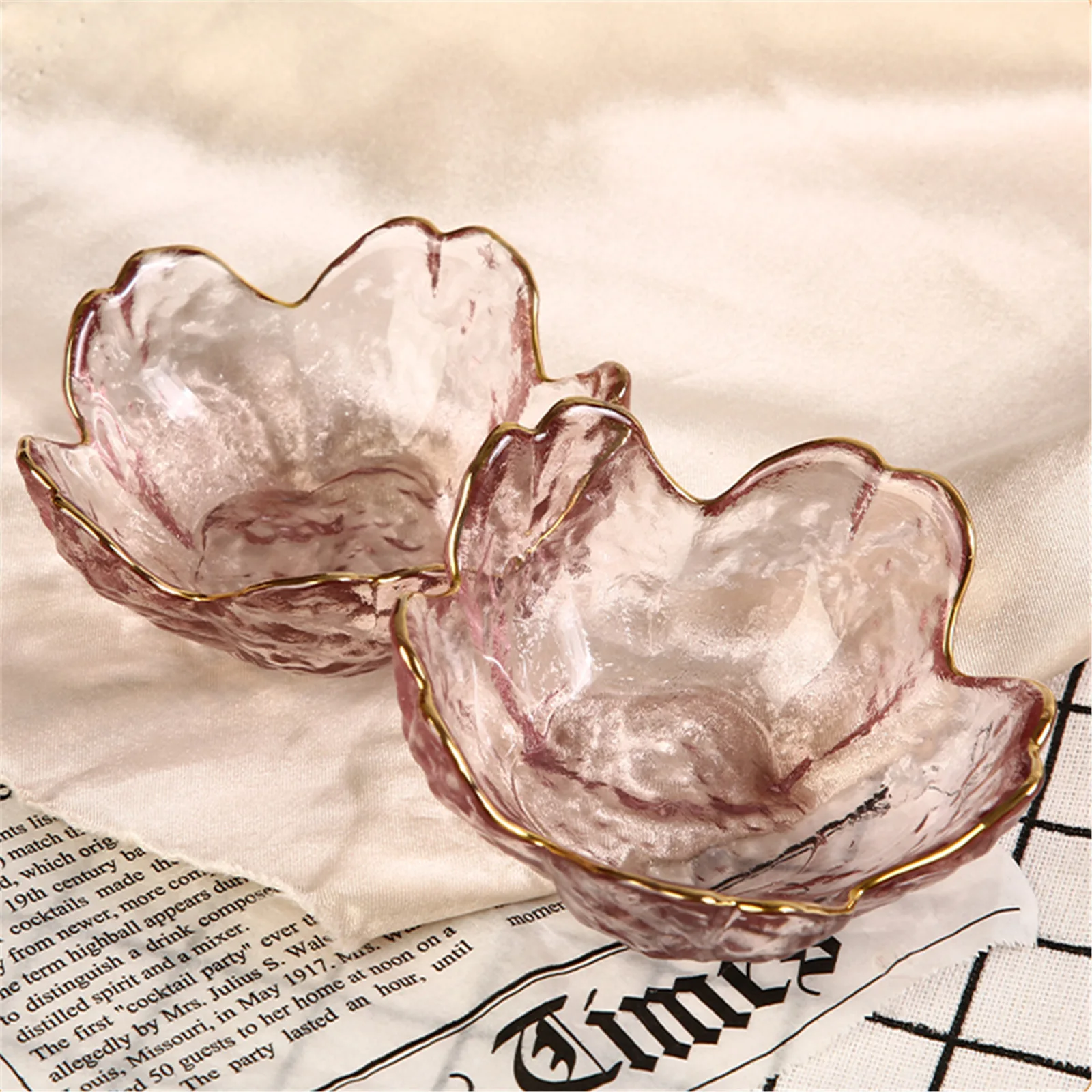 Transparent pink cherry blossom glass bowl with gold inlay rim.