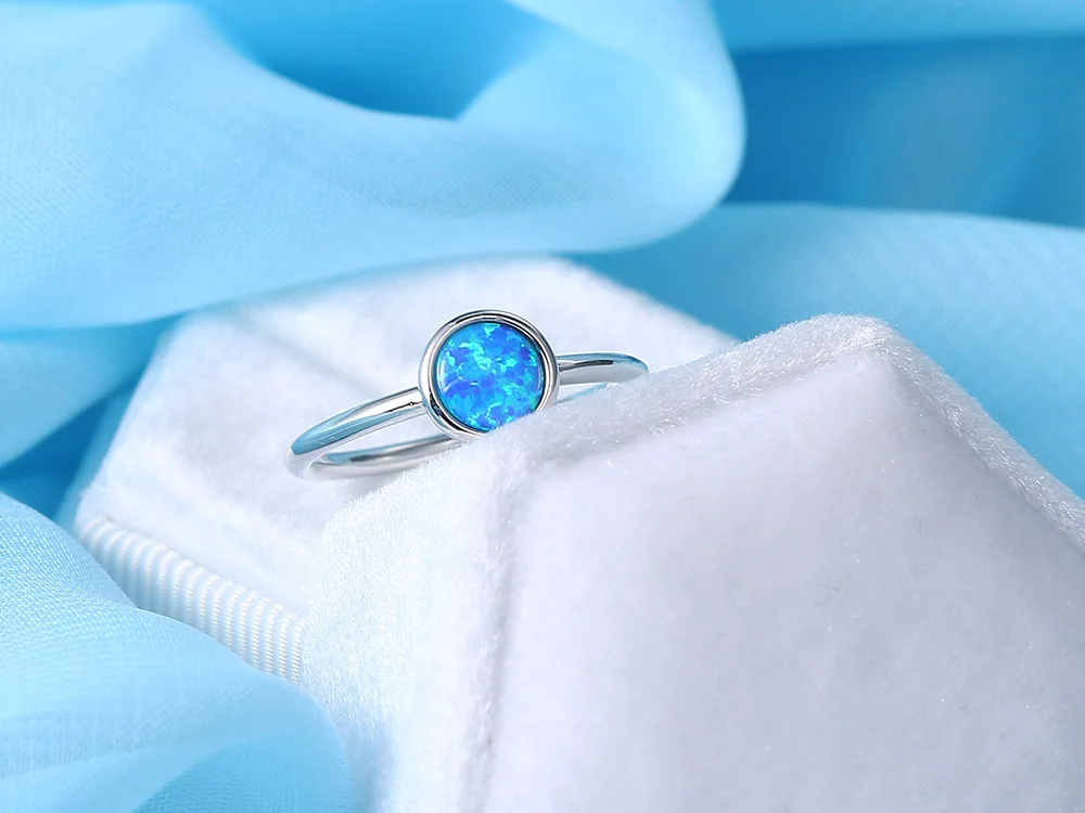 ZHOUYANG Opal Stone Rings For Women Simple Classic Round White Gold Color Party Birthday Gift For Girls Fashion Jeweley DZR032 ZHOUYANG Opal Stone Rings For Women Simple Classic Round White Gold Color Party Birthday Gift For Girls Fashion Jeweley DZR032