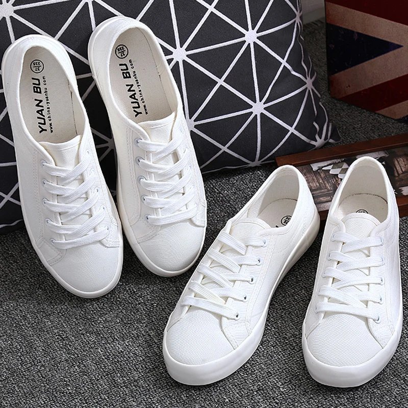 ladies white canvas plimsolls