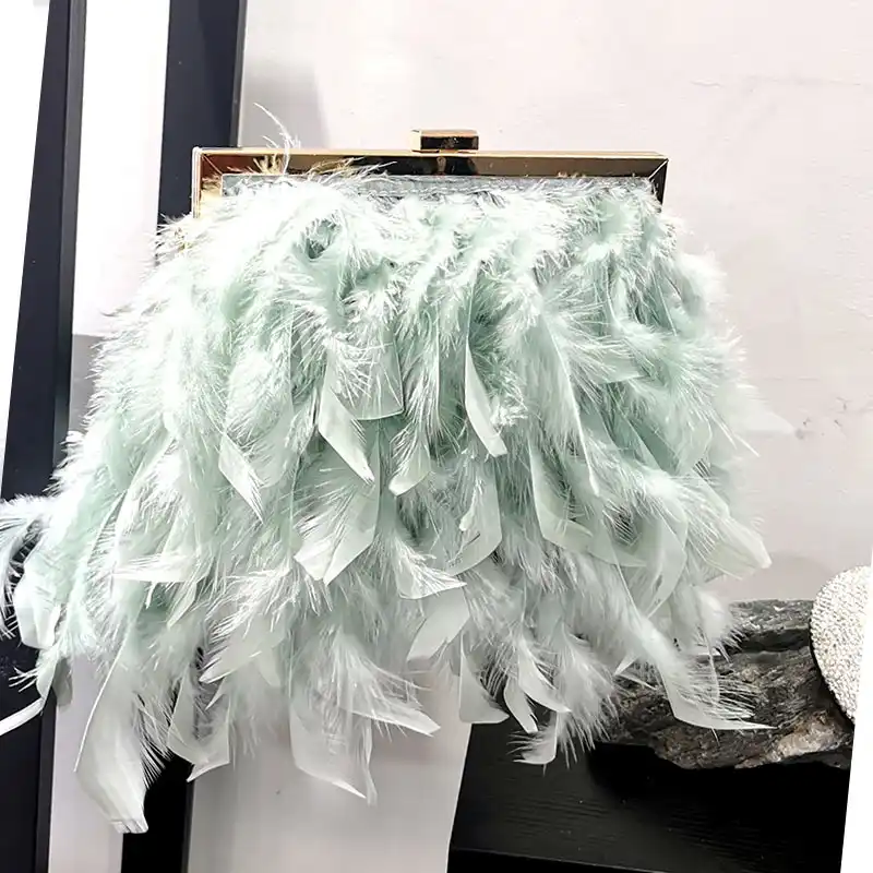 white feather clutch