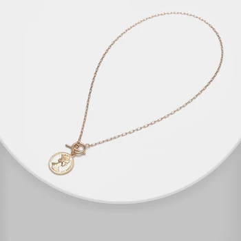 

Amorita boutique Vintage woman head necklace