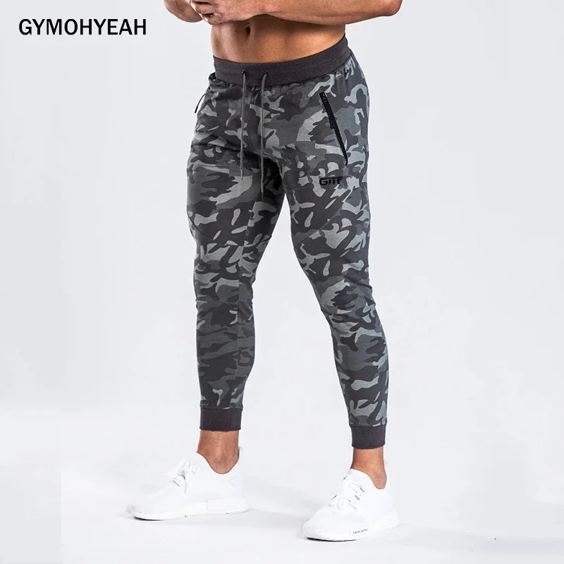 GYMOHYEAH новые мужские брюки модные сращивающиеся шаровары камуфляжные джоггеры