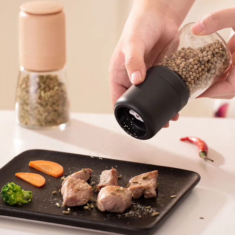 https://ae01.alicdn.com/kf/H401181d456424f2090b66504c428e719B/Black-pepper-sesame-grinder-portable-household-adjustable-pepper-grinder-glass-polisher-seasoning-pot.jpg