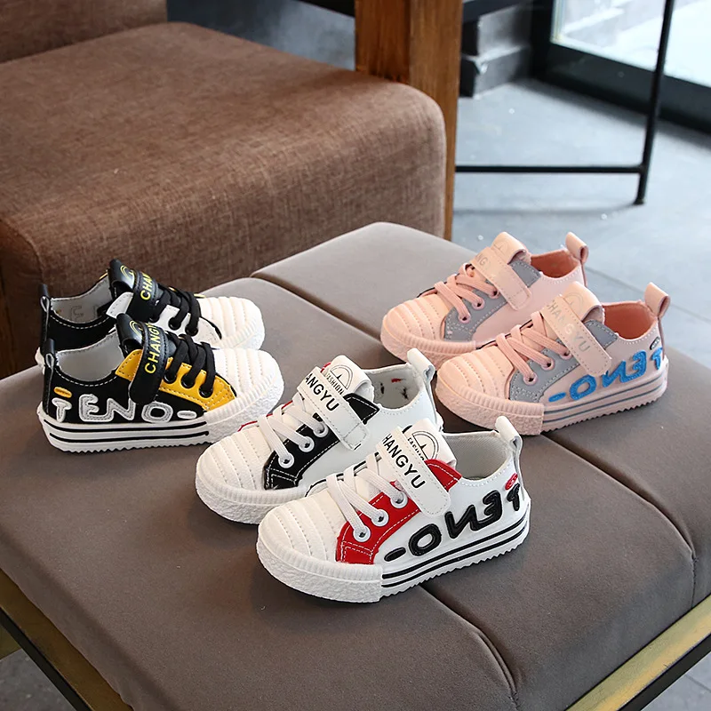 

Spring and Autumn New Children's Letters Toddler Shoes Men and Women Leather Face Graffiti Shell Head Shoes