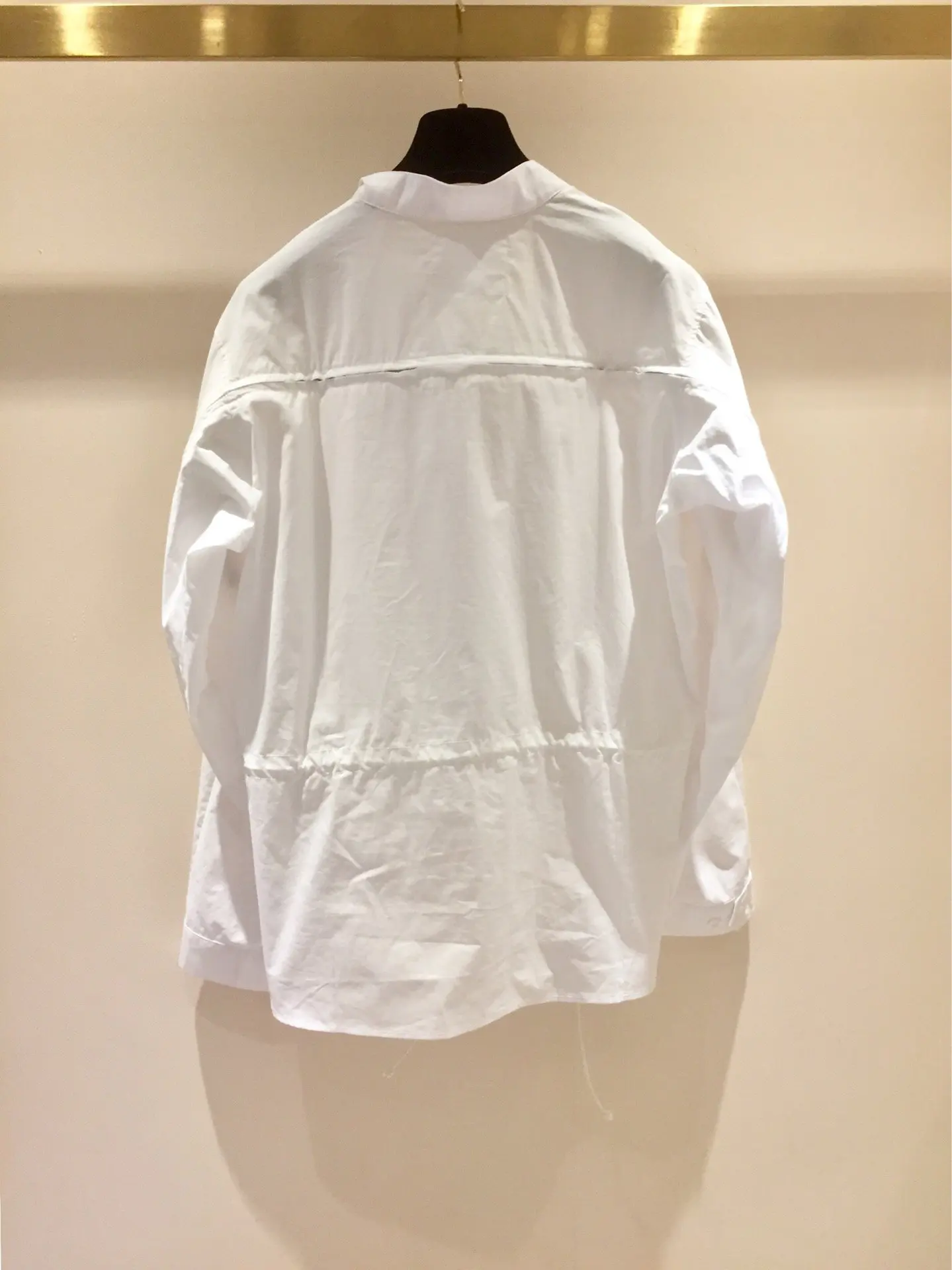 new ladies fashion long-sleeved sexy casual solid color front section long irregular lace-up shirt 1017