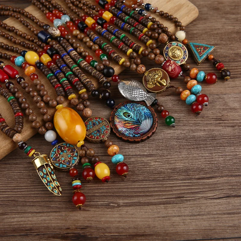 Retro-Nepal-Necklace-Buddhist-Mala-Mantra-Wood-Beads-Pendant-Necklace-Ethnic-Feather-Horn-Fish-Long-Statement