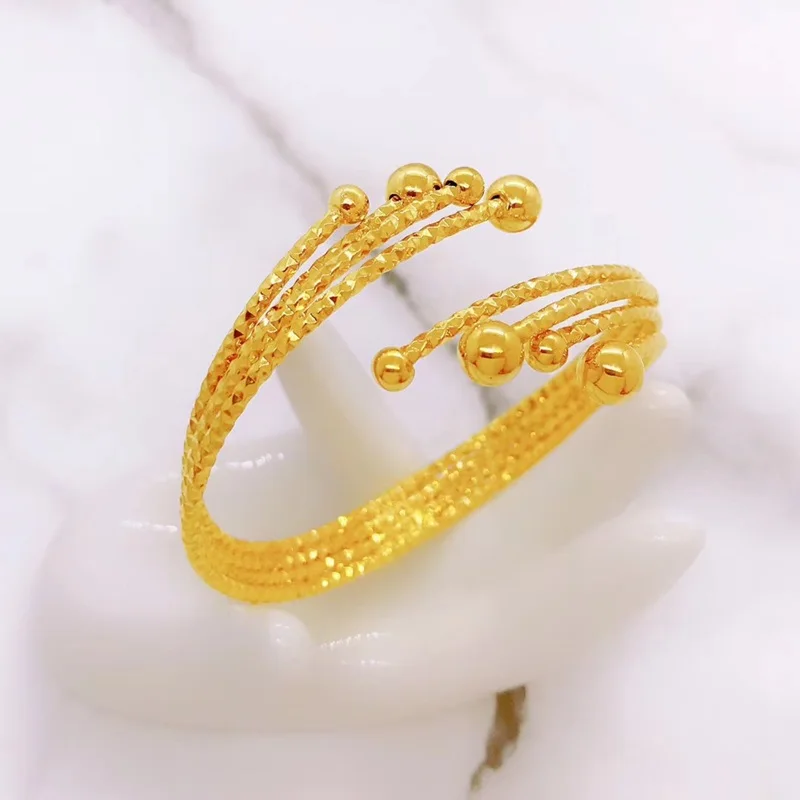 24 каратным золотом