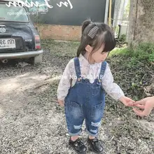 Осенние модные джинсовые комбинезоны с дырками для мальчиков и девочек Детские универсальные повседневные рваные джинсы на подтяжках