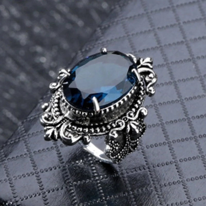 

Sea blue topaz ring European and American retro Thai silver goose egg hand jewelry