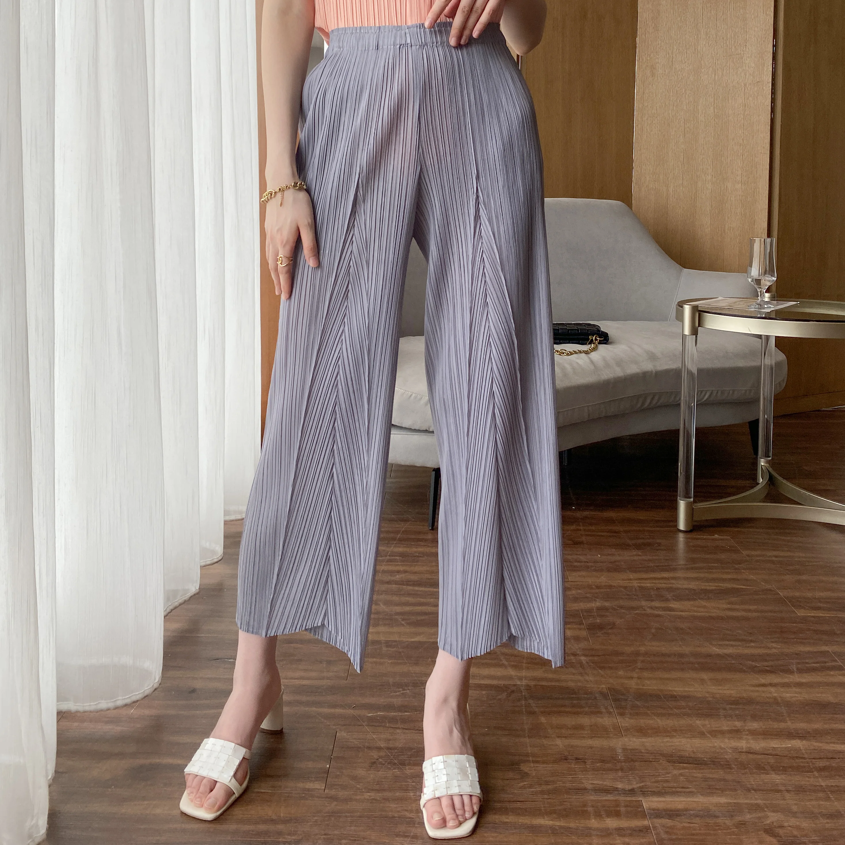Autumn, spring and summer three seasons can wear Miyake pleated fashion temperament versatile casual fashion nine-minute pants women s jeans pear shaped body slightly fat wear big size women s nine minute straight pipe jeans 2023 autumn new