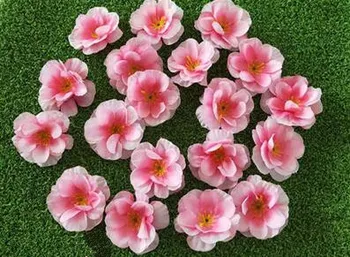 

Imitating peach petals and branches to photograph props for wedding scenery and headdress fake flowers