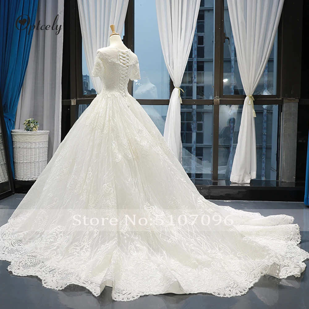 Optcely Vestido De Noiva, Настоящее фото, круглый вырез, короткий рукав, красивое ТРАПЕЦИЕВИДНОЕ свадебное платье, кружевные аппликации, расшитые бисером, платья с коротким шлейфом