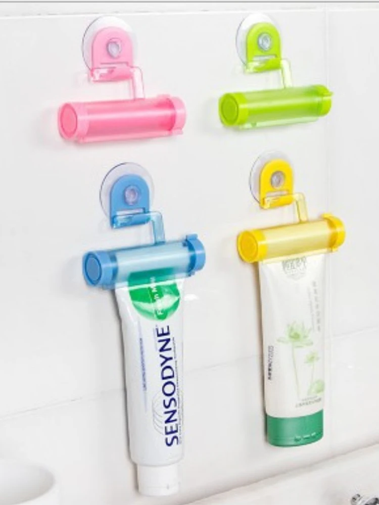 

4 color toothpaste dispenser tube bathroom accessories manual syringe Gun Dispenser rolling extruder sucker holder