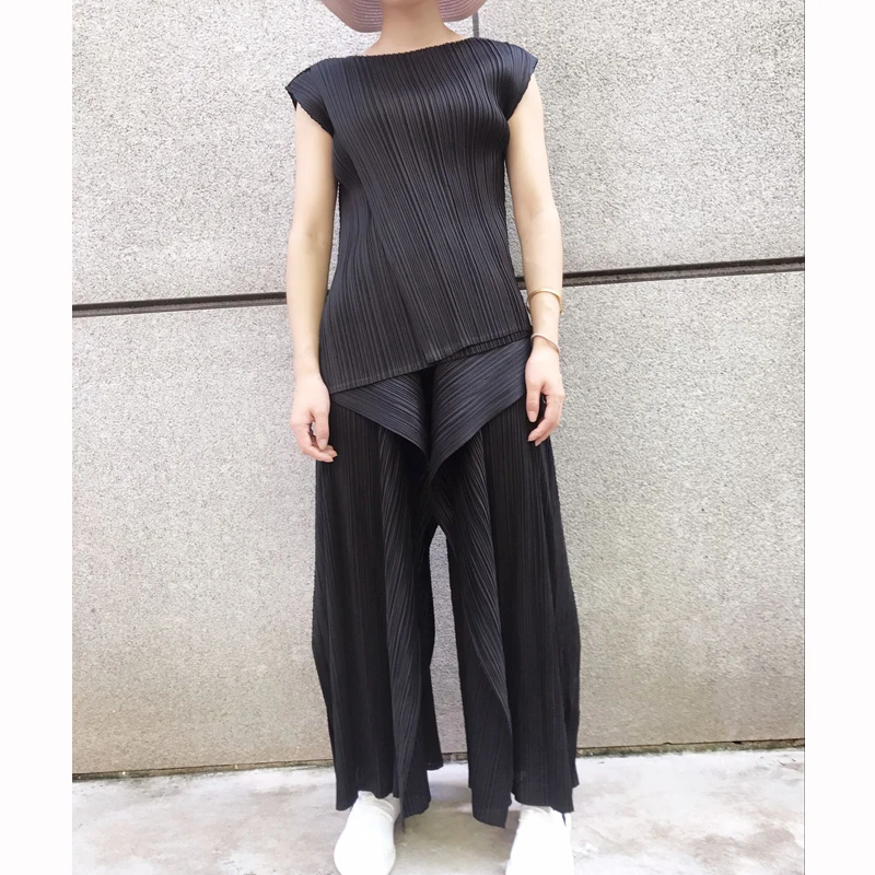 Miyake fold Ранняя осень новая мода индивидуальный дизайн чувство чистый цвет большой код тонкие девять ног Брюки Бесплатная доставка