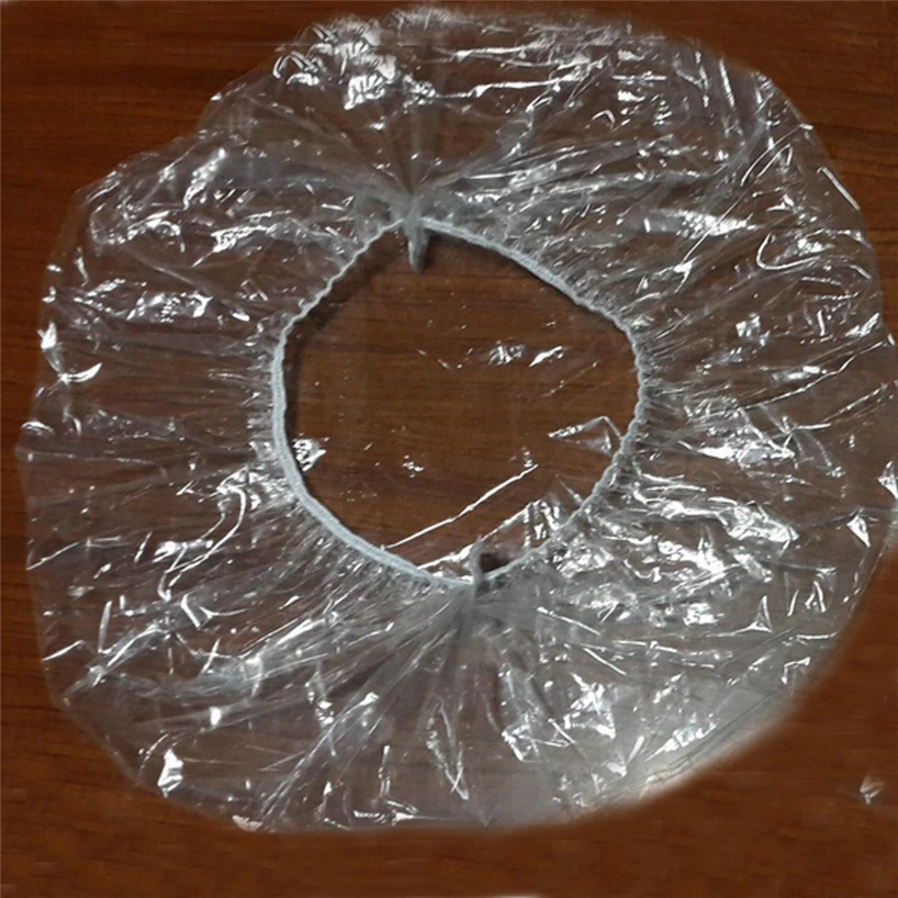 100 transparent plastic shower caps waterproof and dustproof for spa salon Durable practical and convenient household items
