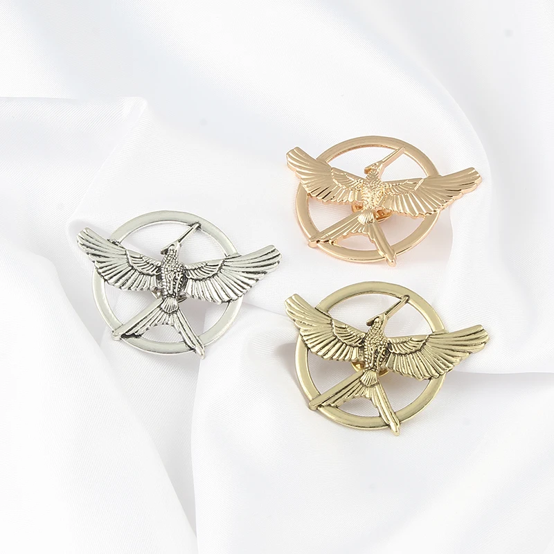 

Hunger Games Badge Brooches Fashion Pop Vintage bird Enamel Pins Mens Womens Jackets lapel Pins Jewelry Metal Brooch Gifts
