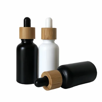 

CBD Recycled eco friendly Round Natural Bamboo Wooden Lid Frosted Black Glass Dropper Bottle with Rubber Cap 15ml 30ml 50ml100ml
