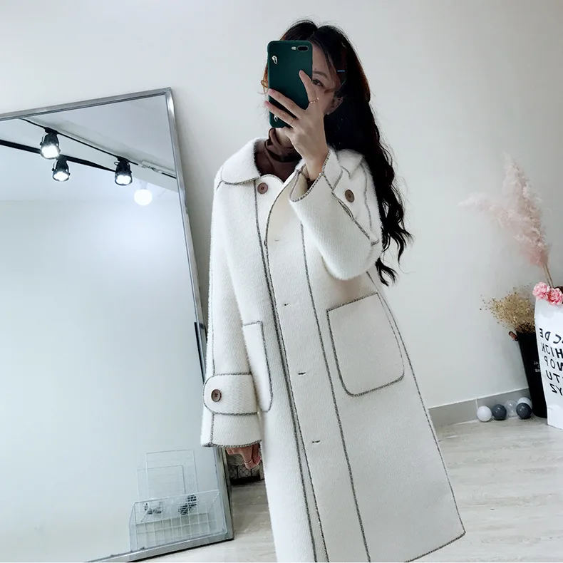 Winter new women coat Korean women's wool coat retro lamb hair in the long winter coat women lapel long sleeve coat