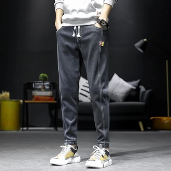 

Fashion Leisure false jeans male Jogging pants Autumn Winter Brand male Little pants Large size M-4XL 18