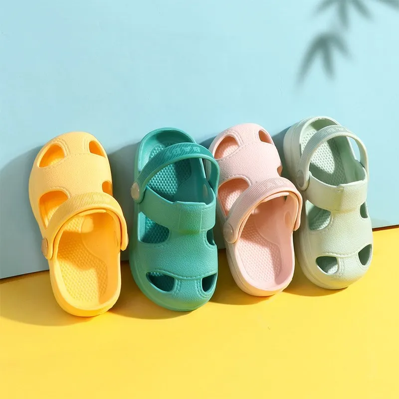 Zapatos con agujeros para bebés, sandalias antideslizantes suaves para niños y niñas de 1 a 3 años, novedad de verano