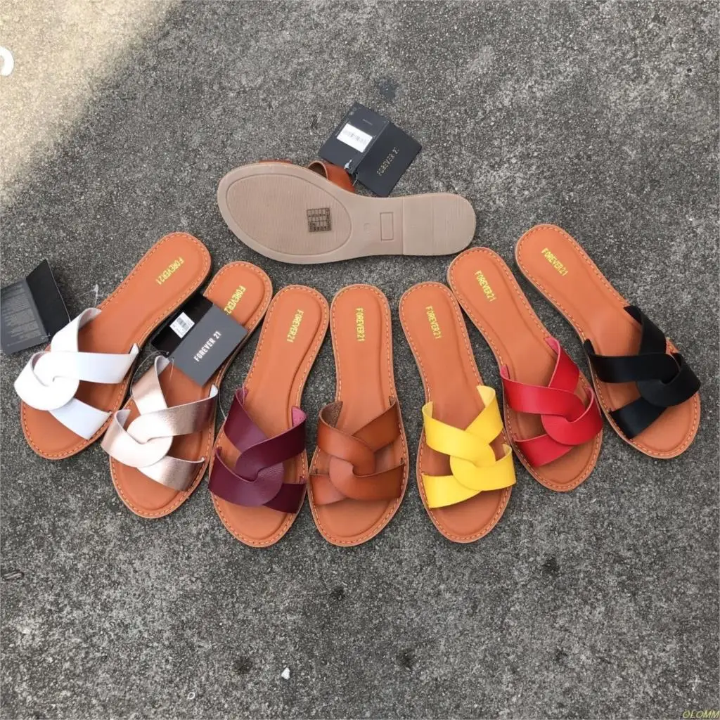 

Factory direct 2019 new women's leather solid color two-layer leather flat bottom beach seaside holiday fashion slippers