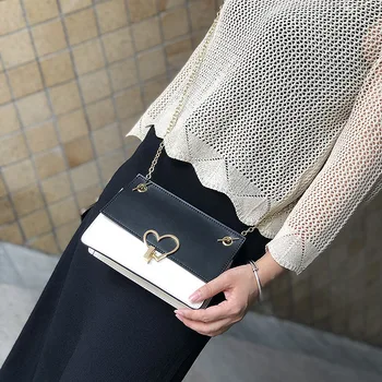 

Spring and Summer New Husky Gas Heart suo kou bao Leather Shoulder Cross-Body Sling Bag