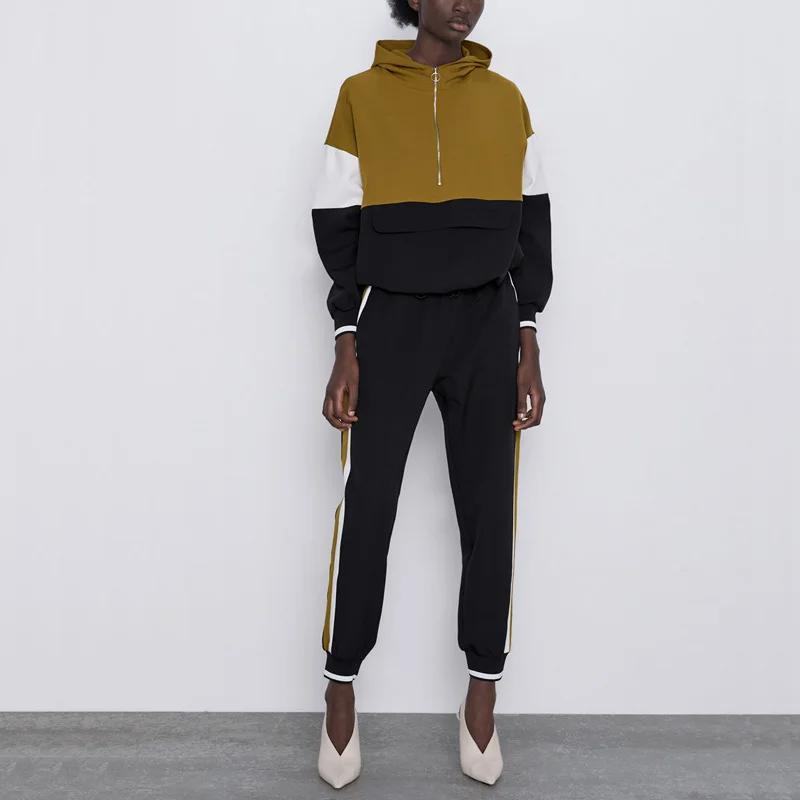 

Autumn and winter women's suit casual solid color stitching hooded telescopic suit